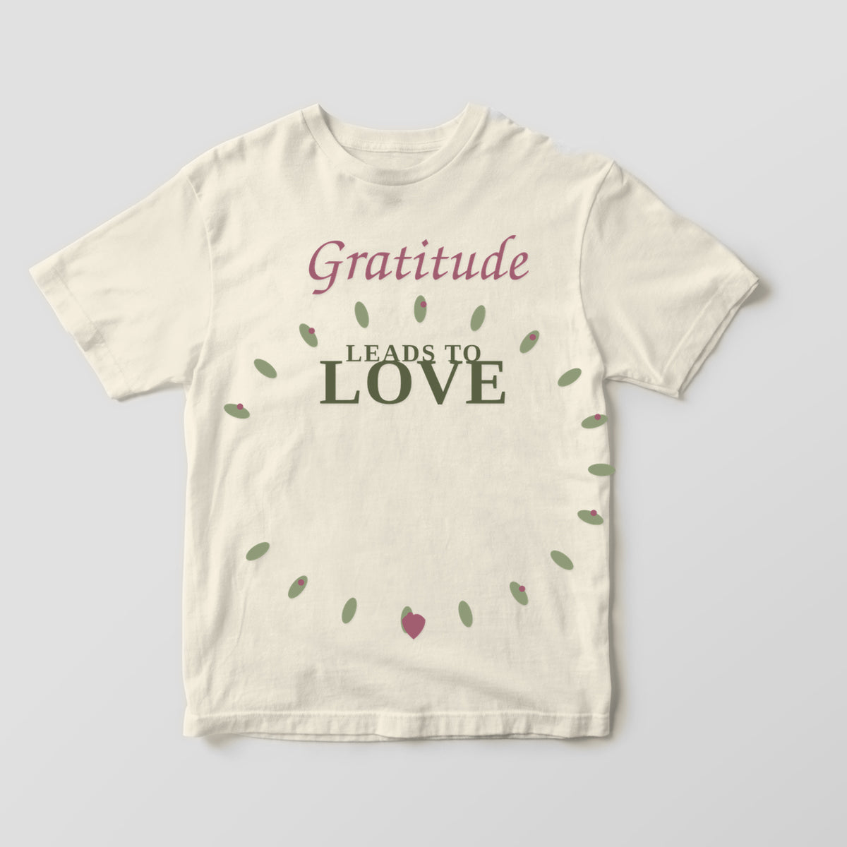 Gratitude Leads to Love graphic tee by Designs by Danna - Warm Ivory hero mockup