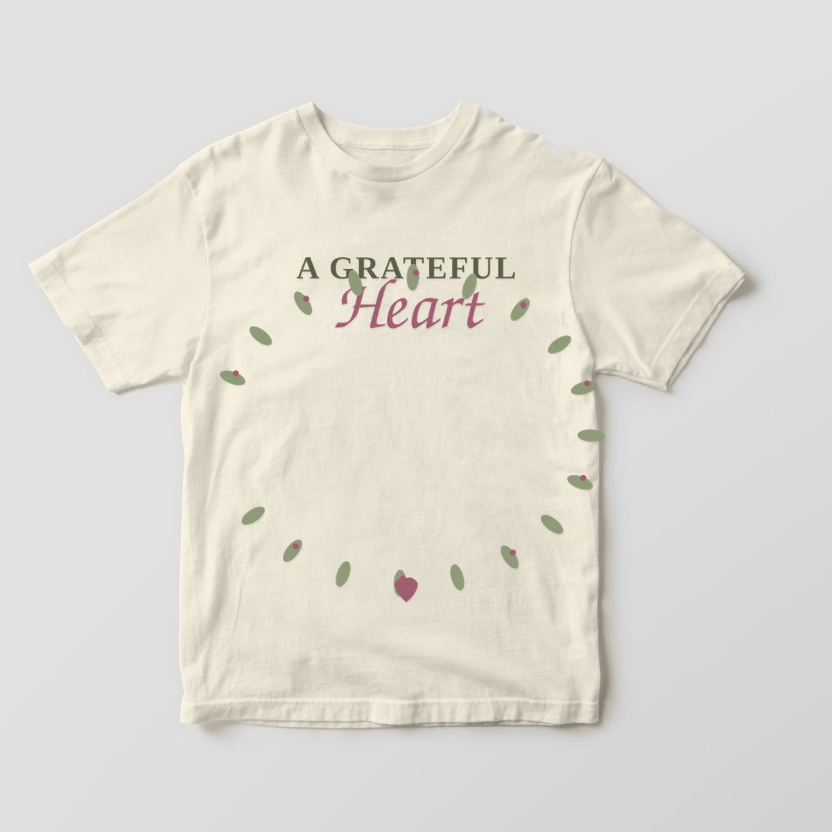 A Grateful Heart graphic tee by Designs by Danna - Warm Ivory hero mockup